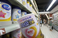 Chinese milk powder producers adhere to stricter standards