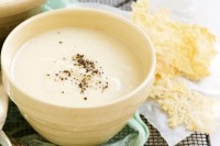 Creamy cauliflower and potato soup with parmesan crisps