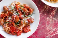 Spaghetti with meatballs and cherry tomatoes