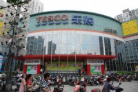 Retail conglomerate China Resources Enterprise's Q1 profit slides 31 pct