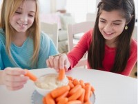 Flavored dip hugely increases kid's fruit and veg intake