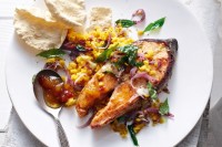 Tikka salmon with red lentil dahl