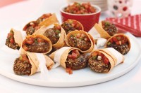 Beef patties in tortilla pockets with tomato salsa
