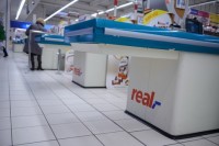 Poland sets conditions for Auchan's Real takeover