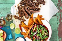 Mexican steak with sweet potato wedges and bean salad