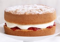 Sponge cake with cheat's strawberry jam and cream