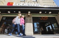 Canadian grocers Loblaw, Metro profits fall as competition intensifies